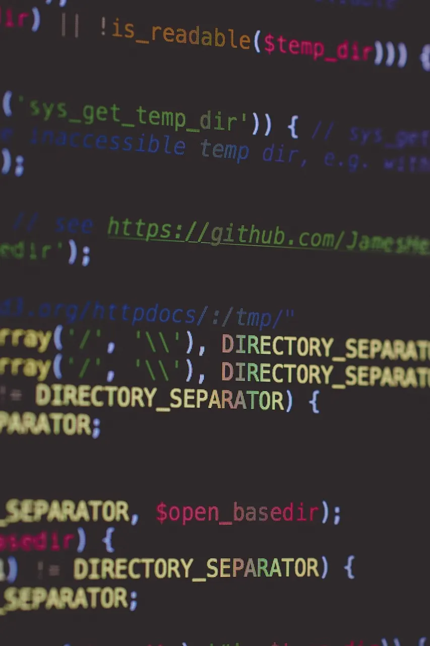 Custom Web Development Close-up of PHP source code on a developer's computer screen for custom web development