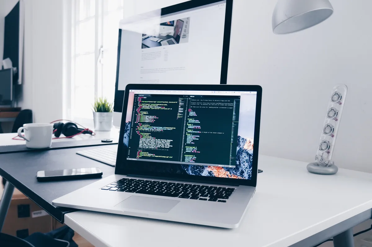 Developer reviewing a server-rendered Next.js application in a terminal and browser