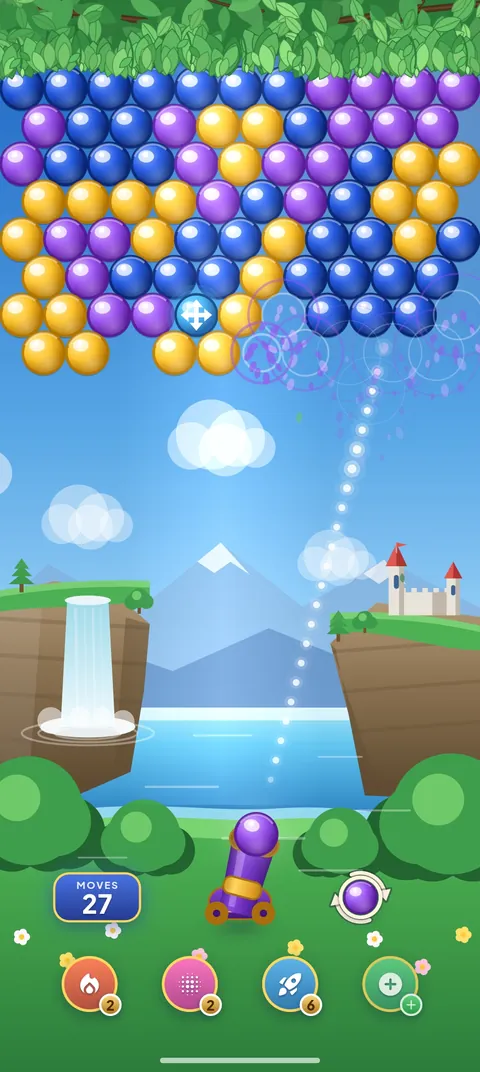 Aiming a bubble shot: the dotted aim guide runs from the cannon to a ring that marks where the purple bubble will land.